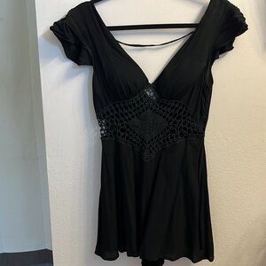 Black crochet middle romper.